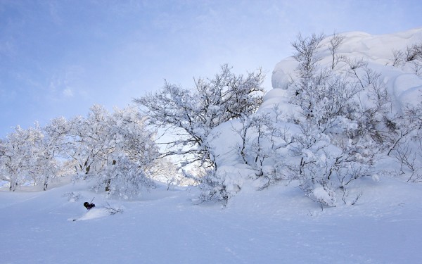 Rory skis beneath some menacing looking pillows in Nozawa Onsen.